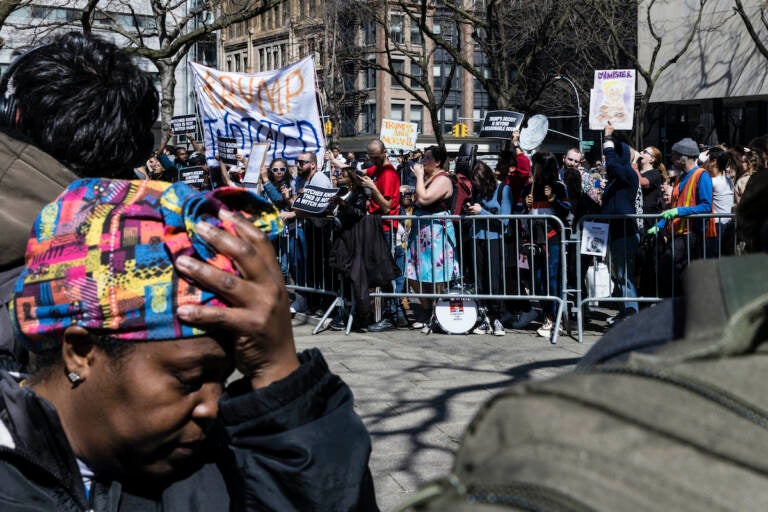 Anti-Trump supporters face off against Trump supporters from a separate pen at a protest held in Collect Pond Park across the street from the Manhattan District Attorney's office in New York