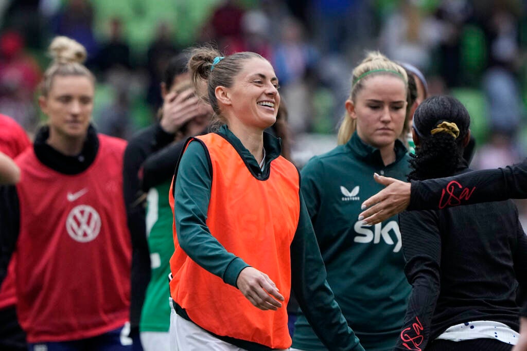 Republic of Ireland's Sinead Farrelly (center) greets players after the team's match with the United States in an international friendly soccer match in Austin