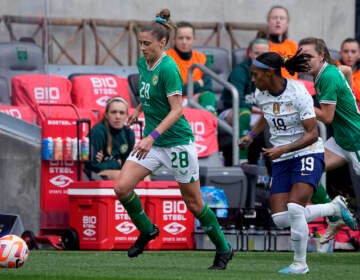 Ireland's Sinead Farrelly (28) moves the ball past United States defender Crystal Dunn (19) during the second half of an international friendly soccer match in Austin