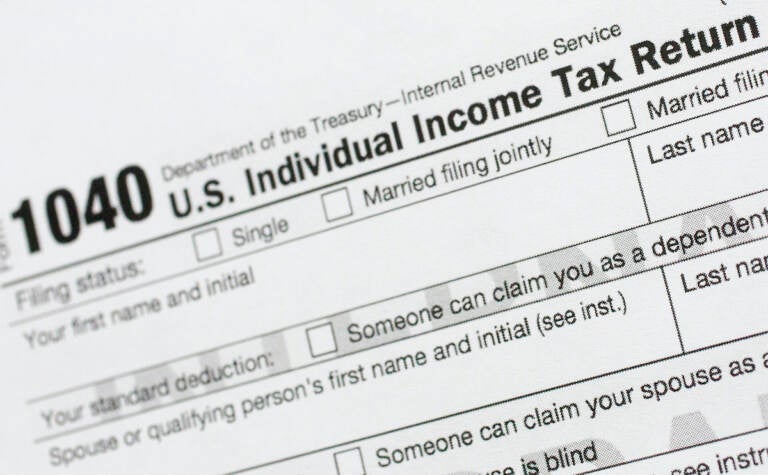 A portion of the 1040 U.S. Individual Income Tax Return form is shown