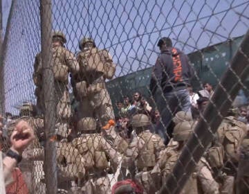 This image from a video released by the Department of Defense shows U.S. Marines at Abbey Gate before a suicide bomber struck outside Hamid Karzai International Airport on Aug. 26, 2021, in Kabul Afghanistan