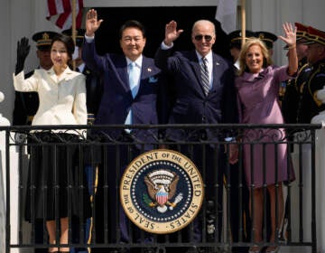 South Korea's first lady Kim Keon Hee, South Korea's President Yoon Suk Yeol​​, President Joe Biden and first lady Jill Biden wave from the Blue Room Balcony during a State Arrival Ceremony on the South Lawn of the White House Wednesday, April 26, 2023, in Washington