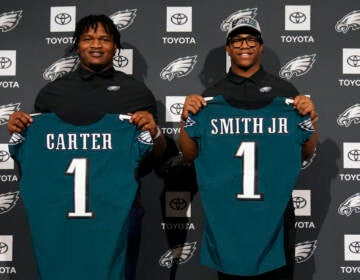 Newly drafted Philadelphia Eagles' Jalen Carter (left) and Nolan Smith pose for a photo after a news conference at the NFL football team's training facility