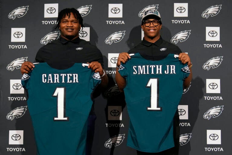 Newly drafted Philadelphia Eagles' Jalen Carter (left) and Nolan Smith pose for a photo after a news conference at the NFL football team's training facility