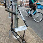 An up-close view of a bike that has a tag on it.