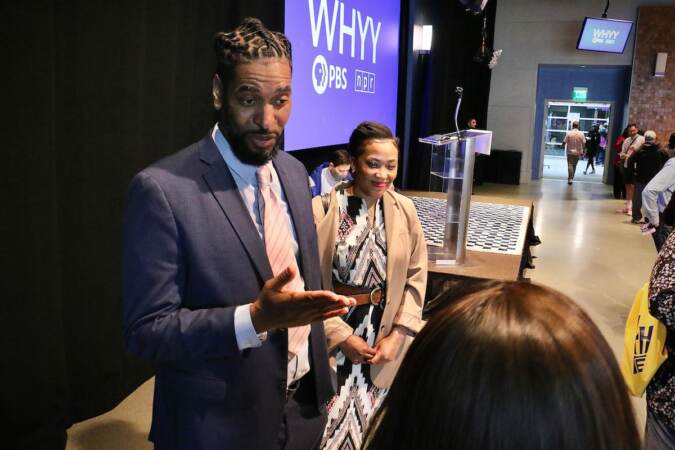 Philadelphia City Council candidate Derwood Selby talks with voters at a candidate convention hosted by WHYY. (Emma Lee/WHYY)