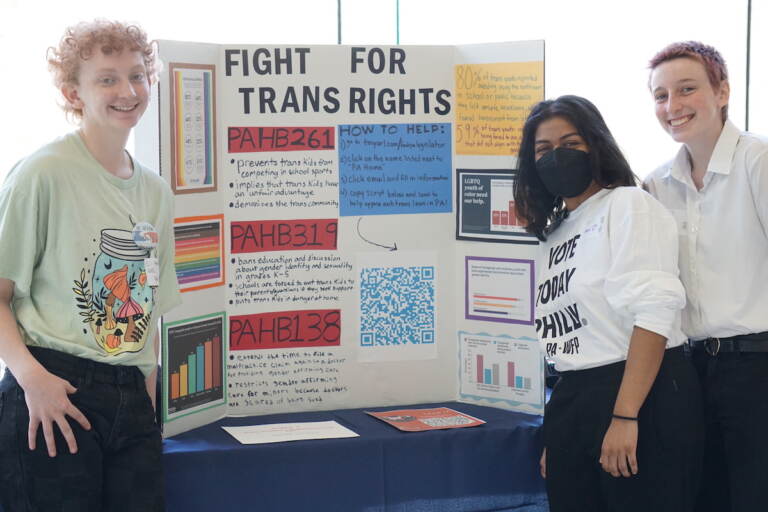 From left to right, Wes Allen, Kavi Shahnawaz, and Kai Willis-Carroll gave a presentation on transgender rights at the 1st Annual Philadelphia Civics Day. (Sam Searles/WHYY)