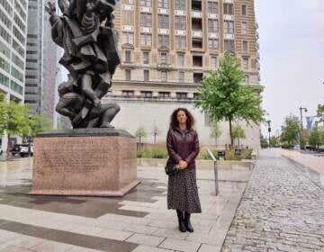 Eszter Kutas stands at Holocaust Memorial Plaza.