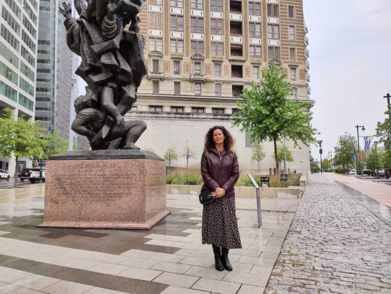 Eszter Kutas stands at Holocaust Memorial Plaza.