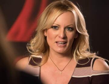 Stormy Daniels talks with a journalist in Berlin shortly after her lawyer filed a defamation case against Donald Trump on her behalf in October 2018.
