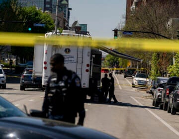 Police tape surrounds the Old National Bank