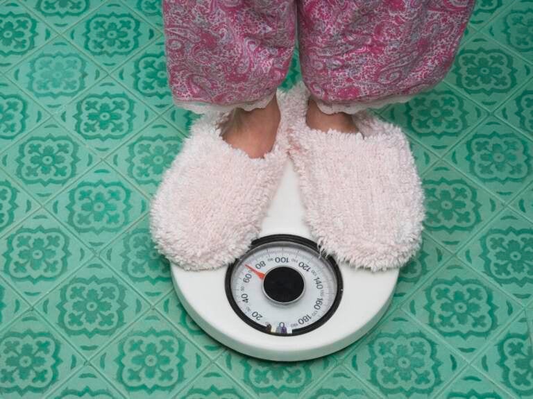 feet on a weight scale