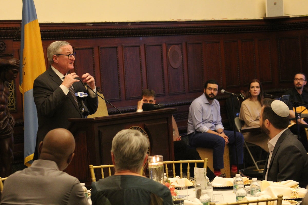 Mayor Kenney addresses a room of people.