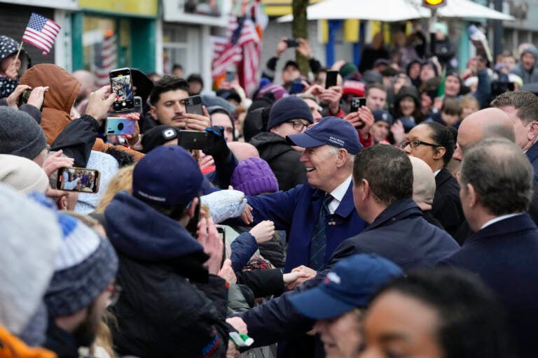 Joe Biden greeting a large group of people