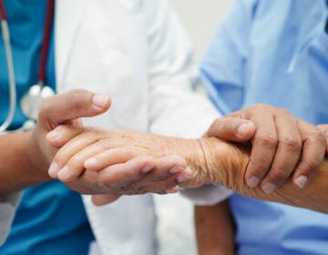 Doctor Holding Hands Asian Elderly Woman Patient, Help And Care