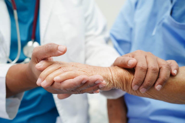 Doctor Holding Hands Asian Elderly Woman Patient, Help And Care