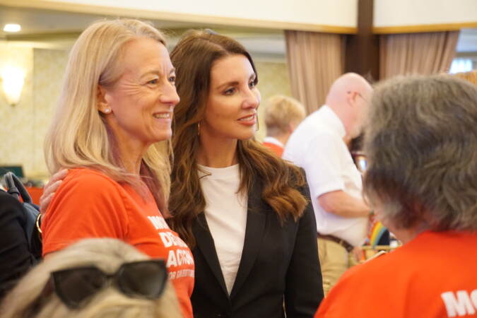 Shannon Watts poses for a photo with a supporter.