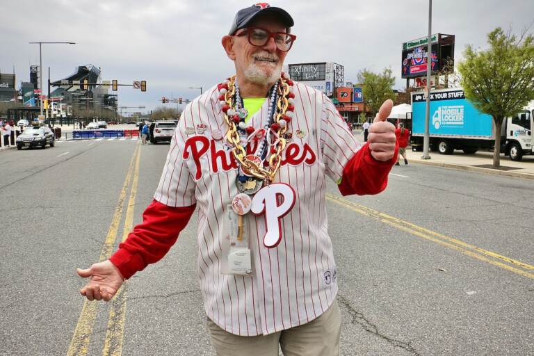Steve Wilson gives a thumbs up as he poses, decked out in Phillies gear.