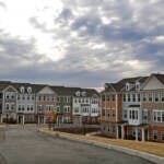 Townhouses in a cul-de-sac are visible.