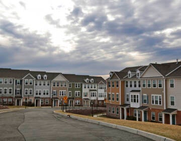 Townhouses in a cul-de-sac are visible.