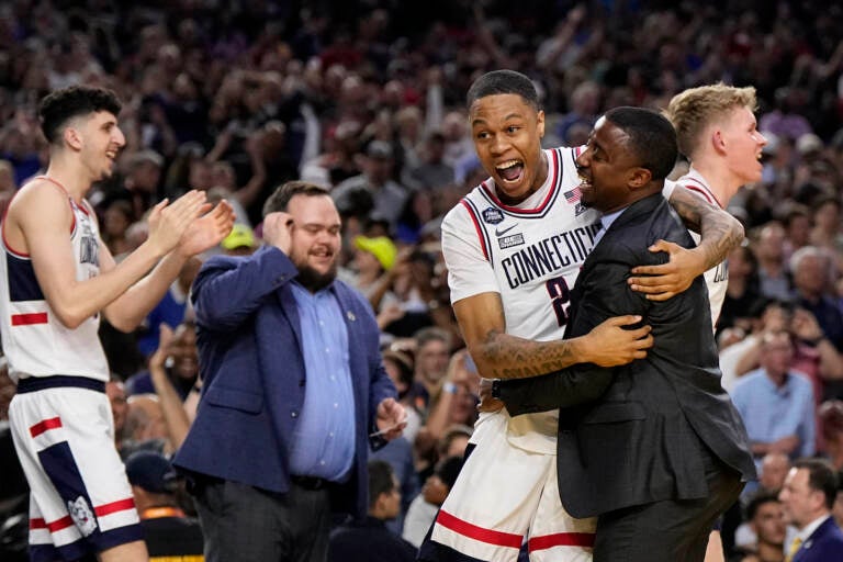 Connecticut guard Jordan Hawkins celebrates after the men's national championship college basketball game against San Diego State in the NCAA Tournament