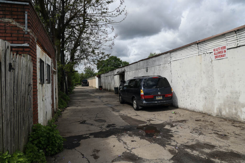 Car pared in an alley.