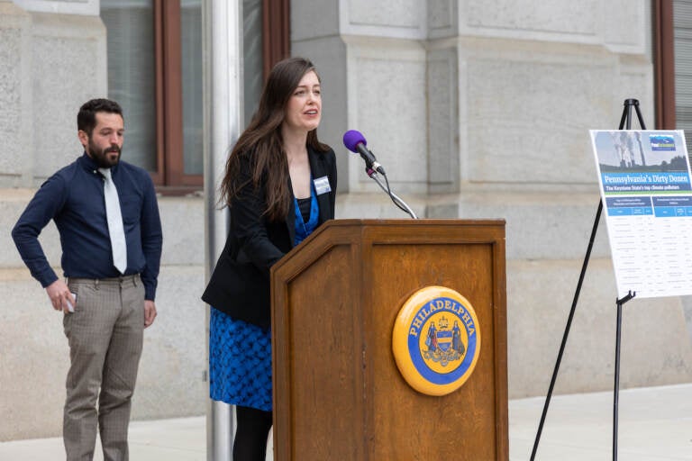 Stephanie Wein speaks at a podium.