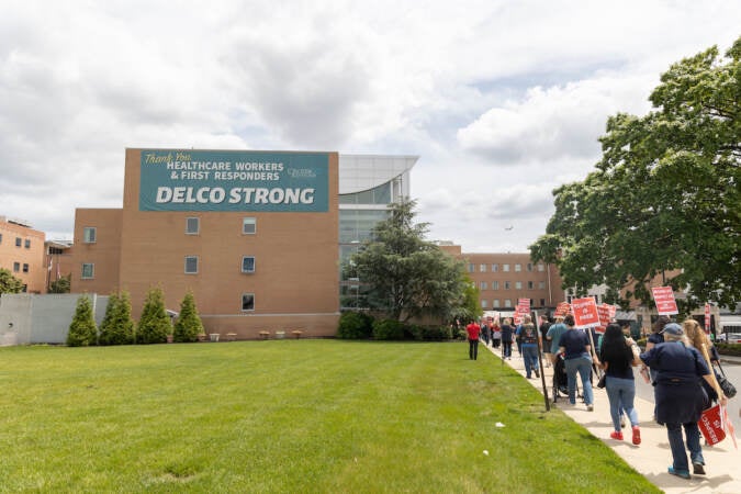 PASNAP nurses marched in front of Crozer-Chester Medical Center in Upland, Pa., on May 19, 2023. (Kimberly Paynter/WHYY)