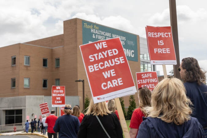 PASNAP nurses marched in front of Crozer-Chester Medical Center in Upland, Pa., on May 19, 2023. (Kimberly Paynter/WHYY)