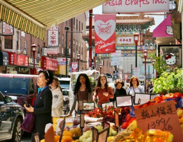 People shopping an an outdoor market.