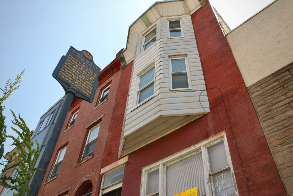 A historical marker is visible next to the Tanner House.