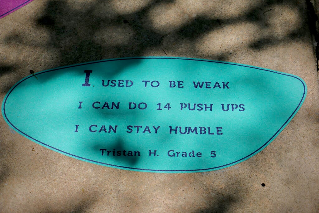 A student's haiku on the sidewalk