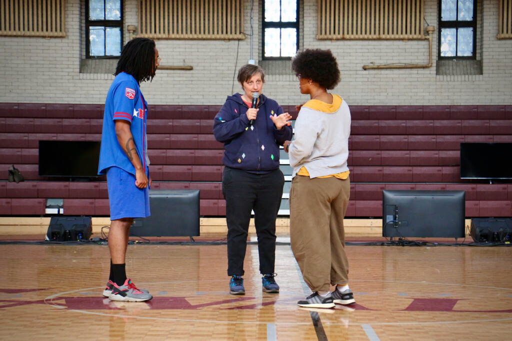 Director Brooke O'Harra (center) works with performers David Gaines and Yolanda Wisher during a rehearsal of ''Be Holding'' at Girard College.