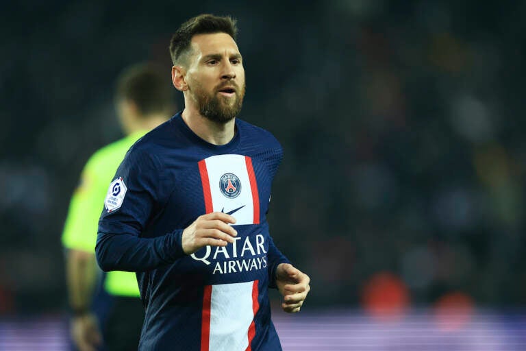 PSG's Lionel Messi runs during the French League One soccer match between Paris Saint-Germain and Lyon at the Parc des Princes stadium in Paris