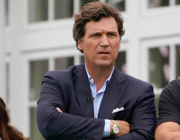 Tucker Carlson attends the final round of the Bedminster Invitational LIV Golf tournament in Bedminster, N.J.