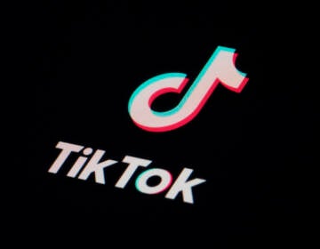 The icon for the video sharing TikTok app is seen on a smartphone, Feb. 28, 2023, in Marple Township, Pa.