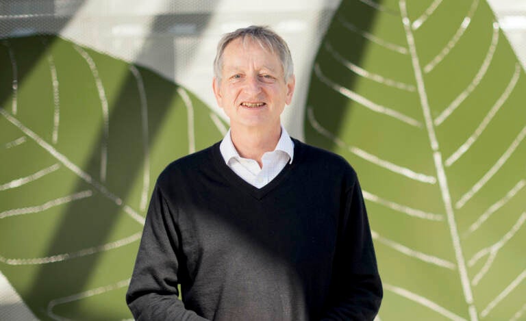 Computer scientist Geoffrey Hinton poses at Google's Mountain View, Calif, headquarters on Wednesday, March 25, 2015. Computer scientists who helped build the foundations of today's artificial intelligence technology are warning of its dangers, but that doesn't mean they agree on the risks or how to prevent disastrous outcomes. (AP Photo/Noah Berger, File)