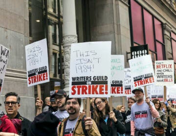 Members of the Writers Guild of America union protest outside the Netflix headquarters near Union Square, Wednesday, May 3, 2023, in New York. 
(AP Photo/Stefan Jeremiah)