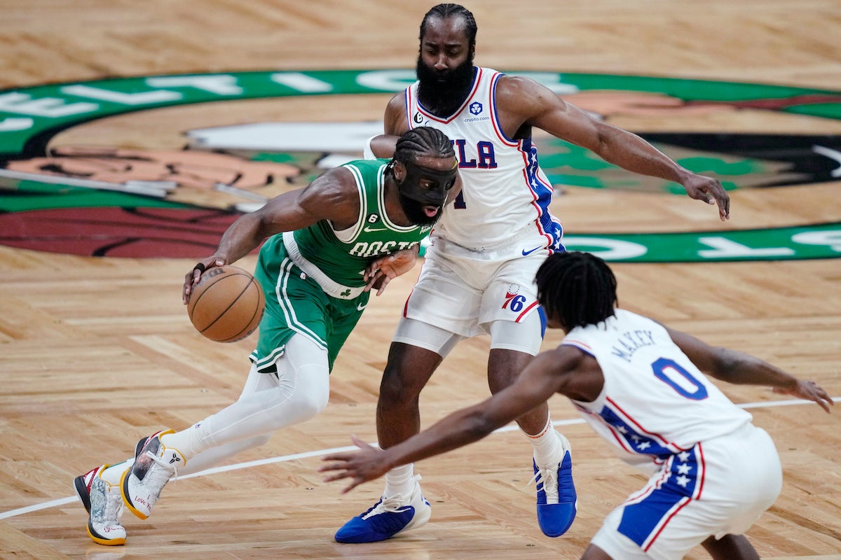 Jayson Tatum of the Boston Celtics drives down court during the