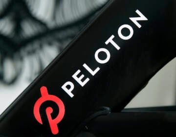 Peloton exercise machine with logo