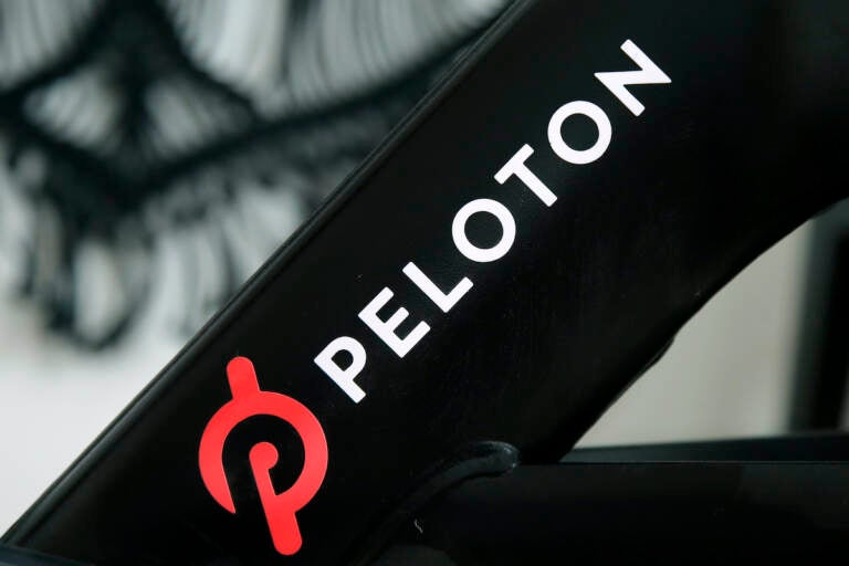 Peloton exercise machine with logo