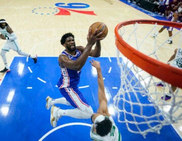 Philadelphia 76ers' Joel Embiid shoots against Boston Celtics' Derrick White during the second half of Game 6 of an NBA basketball playoffs Eastern Conference semifinal, Thursday, May 11, 2023, in Philadelphia