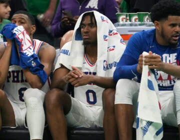 Philadelphia 76ers guard Tyrese Maxey (0) is seated near guard De'Anthony Melton, left, as the 76ers trail the Boston Celtics during the second half of Game 7 in the NBA basketball Eastern Conference semifinals playoff series, Sunday, May 14, 2023, in Boston