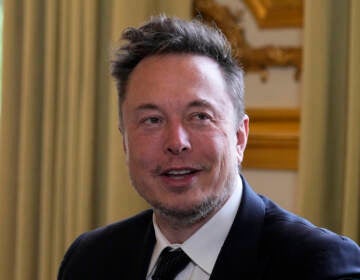 Elon Musk poses prior to his talks with French President Emmanuel Macron, May 15, 2023 at the Elysee Palace in Paris. A federal appeals court says Musk cannot back out of a settlement with securities regulators over 2018 tweets claiming he had the funding to take Tesla private. The 2nd U.S. Circuit Court of Appeals in Manhattan ruled Monday, May 15, 2023 just days after hearing arguments from lawyers in the case. 
(AP Photo/Michel Euler, Pool), file