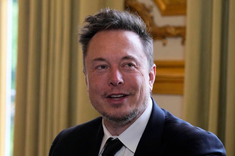 Elon Musk poses prior to his talks with French President Emmanuel Macron, May 15, 2023 at the Elysee Palace in Paris. A federal appeals court says Musk cannot back out of a settlement with securities regulators over 2018 tweets claiming he had the funding to take Tesla private. The 2nd U.S. Circuit Court of Appeals in Manhattan ruled Monday, May 15, 2023 just days after hearing arguments from lawyers in the case. 
(AP Photo/Michel Euler, Pool), file