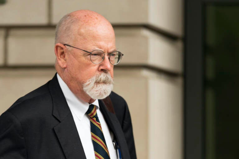 FIle photo: Special counsel John Durham, the prosecutor appointed to investigate potential government wrongdoing in the early days of the Trump-Russia probe, leaves federal court in Washington, May 16, 2022. Durham ended his four-year investigation into possible FBI misconduct in its probe of ties between Russia and Donald Trump’s 2016 presidential campaign. The report Monday, May 15, 2023, from Durham offers withering criticism of the bureau but a meager court record that fell far short of the former president’s prediction he would uncover the “crime of the century.”
