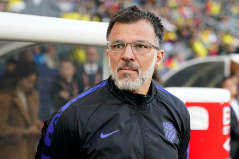 United States interim head coach Anthony Hudson stands near the bench before an international friendly soccer match against Colombia Saturday, Jan. 28, 2023, in Carson, Calif. Hudson quit as interim head coach of the U.S. men's soccer team on Tuesday, May 30, 2023. just two weeks before he was to lead the Americans in the CONCACAF Nations League semifinals. He was replaced by B.J. Callaghan, another holdover from Gregg Berhalter's former staff