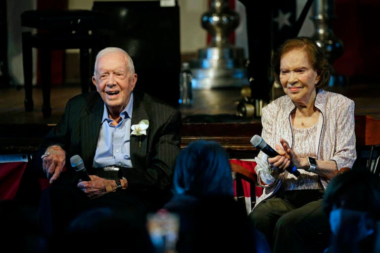 Former President Jimmy Carter and his wife former first lady Rosalynn Carter sit together during a reception to celebrate their 75th wedding anniversary on July 10, 2021, in Plains, Ga. The Carter family shared news that Rosalynn Carter has dementia, The Carter Center announced Tuesday, May 30, 2023. (AP Photo/John Bazemore, Pool, File)