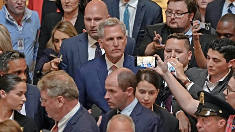 House Speaker Kevin McCarthy of Calif., speaks with reporters on the debt limit as he walks, Tuesday, May 30, 2023, on Capitol Hill in Washington