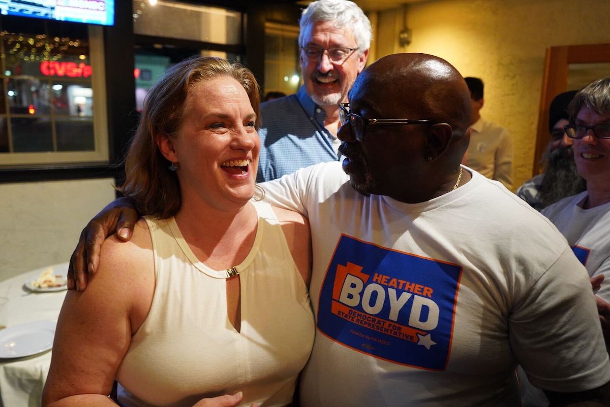 Boyd hugging supporters at Election 2023 watch party.